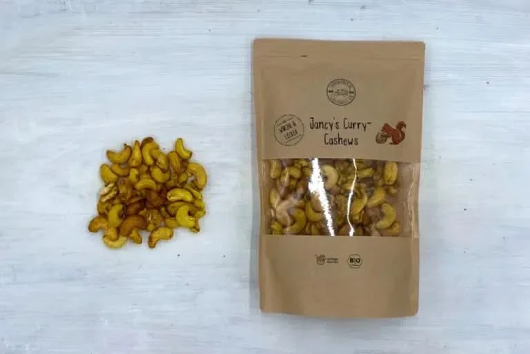 Jancy’s Curry Cashews Bio - Image 3